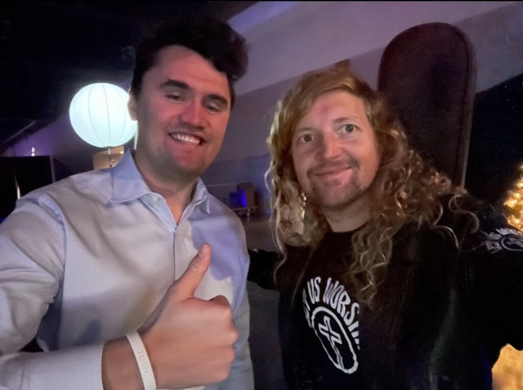 Sean Feucht, right, with Charlie Kirk, 